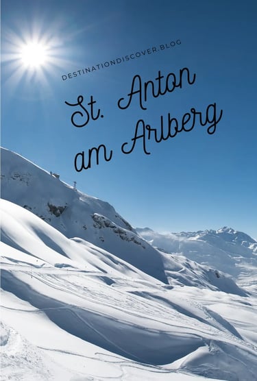 St. Anton am Arlberg title or logo with snowy mountain peaks in the background. Austrian ski resort