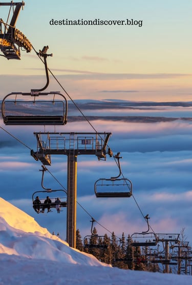 Enclosed ski lift ascending above vast snowy slopes in the Austrian Alps. Scenic aerial view of the