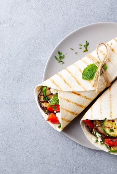 Multigrain tortilla wrap which is also high in protein and high in carb . healthy snacks