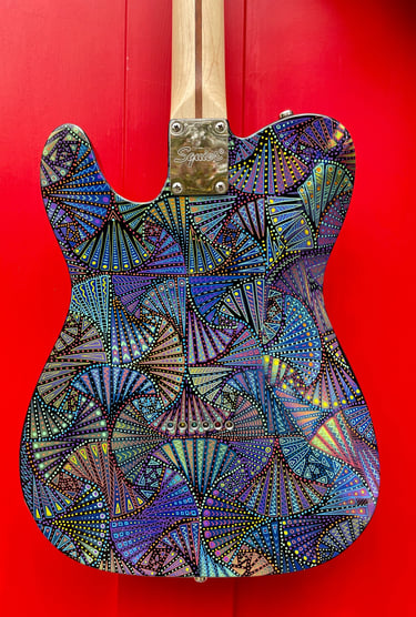 Hand-painted guitar by Nancy Elhallak. Ronnie Wood of the Rolling Stones and Paul Weller of the Jam 