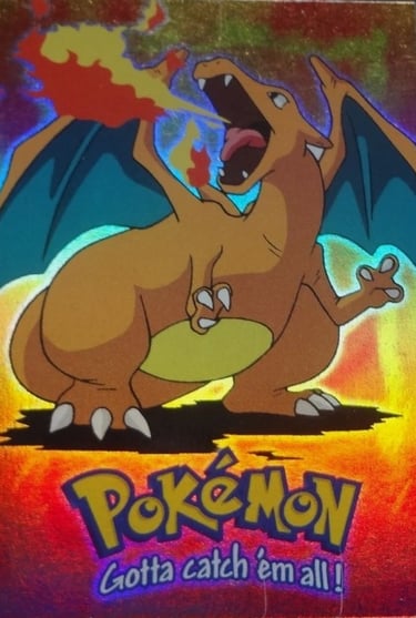 E6 Of E12 Charizard Topps Pokémon The First Movie rainbow foil