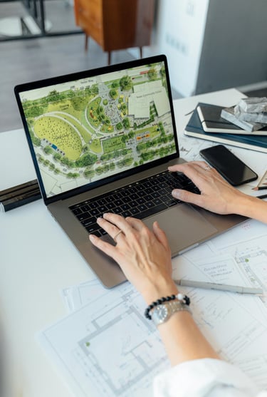 Landscape design and planning on laptop – Yie Yang Landscape