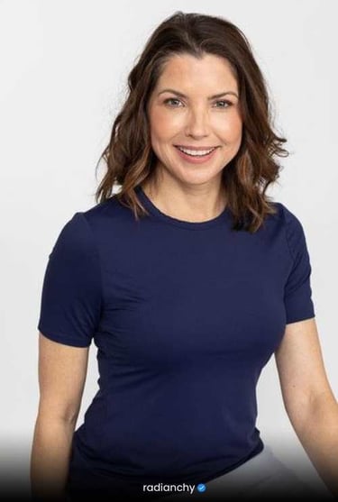 a woman in a blue shirt and a white shirt