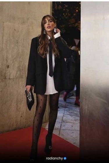 a woman in a white dress and black stockings