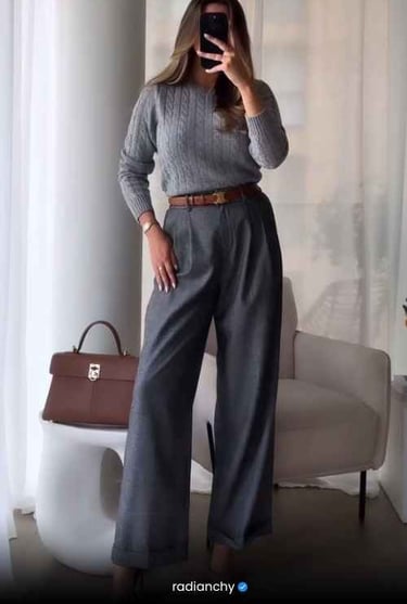 a woman in a gray sweater and pants