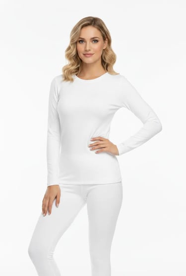 Elegant white thermal athletic wear for ice rink practice and outdoor skating.