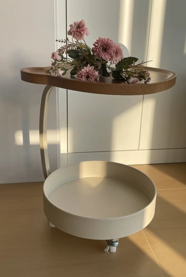 Lightweight small side table with flowers, designed for cozy balcony reading corners and compact out