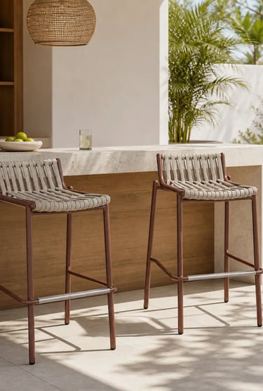 Small balcony seating area with woven outdoor chairs, natural light, and a relaxed setting for a coz