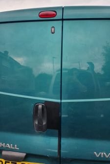 Van handle shield