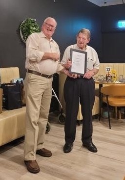 Bill Hoare receives his 20-year Service Award from President Keith