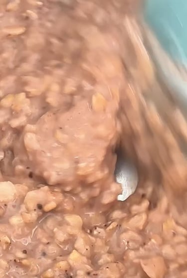 Add and stir the cocoa powder until fully blended