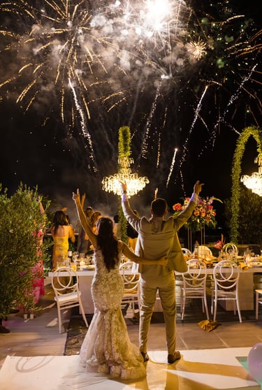 Magical first dance moment enhanced by dazzling wedding fireworks