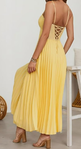back of yellow pleated dress with criss cross back straps