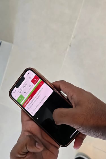 Engineer is using mobile inspection application during property assessment