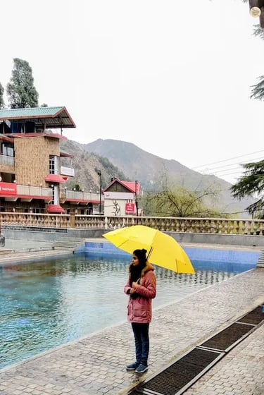 Sacred water kund at Bhagsunag Temple in McLeod Ganj, Dharamshala, visited by pilgrims for prayer and spiritual cleansing.