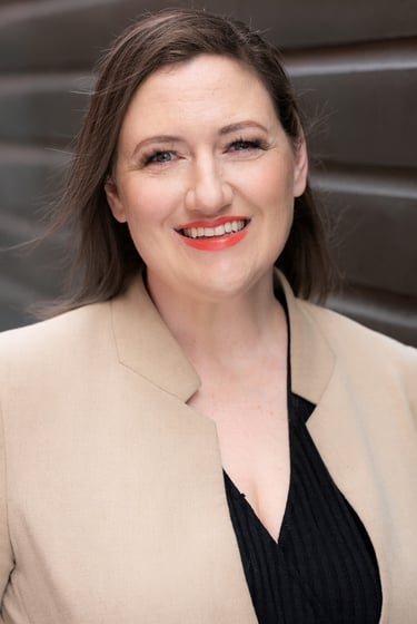 Maple Valley notary Riah smiling in a professional headshot for her mobile notary signing services.