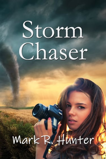 Book cover of Storm Chaser by Mark R. Hunter. Allie holds a camera to a tornado in a crop field..