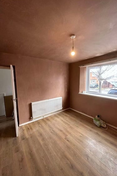 Interior wall with smooth plaster finish by Franklins Plastering in Worcester.