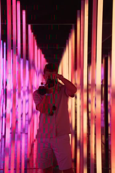 a man taking a picture of himself in a mirror