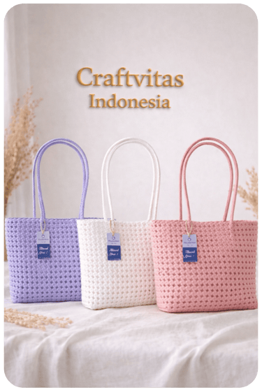 Pastel handwoven plastic tote bags in purple, white, and pink by Craftvitas Indonesia