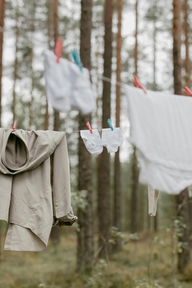 Clothes hanging on a clothesline.  An energy saving alternative option to using the clothes dryer/