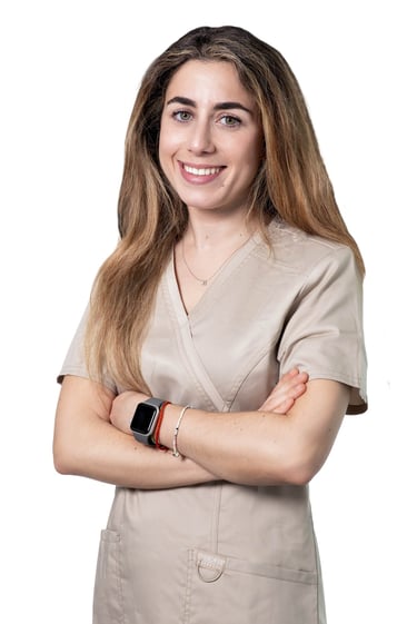a woman in a nurse's uniform with a smart watch. dentista, Doctora, Clinica dental