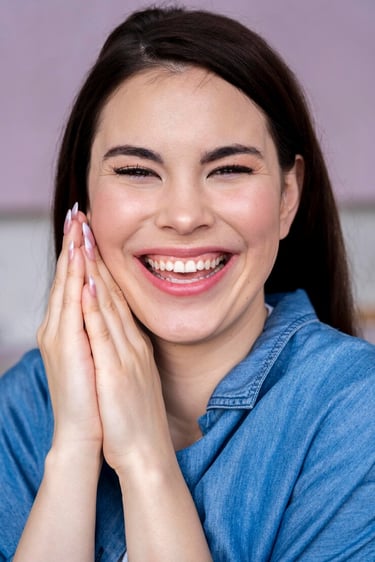 woman wearing blue teeth whitening
