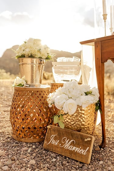 a table with a vase and vases on it