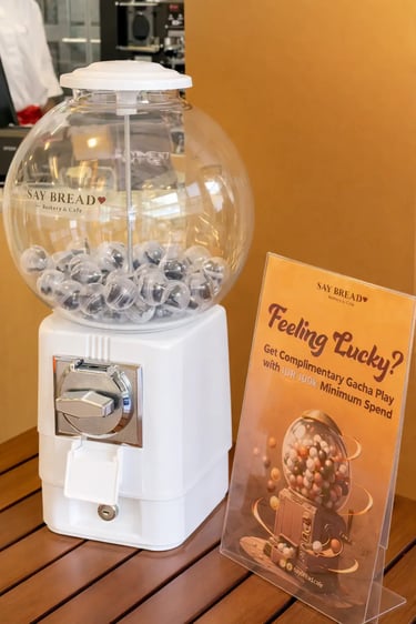Small gacha machine di Say Bread Bakery & Cafe Cikajang Jakarta sebagai activation minimum purchase
