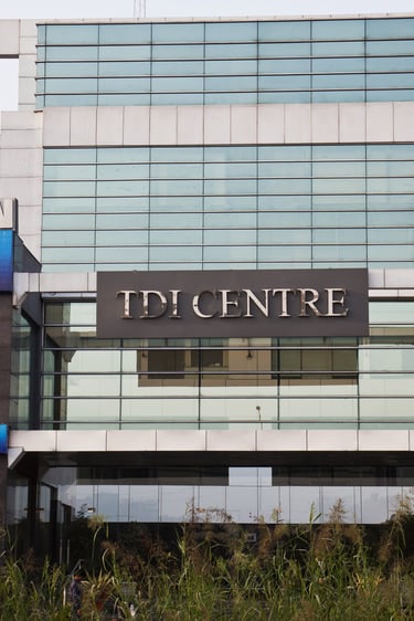 a building with a sign that says TDI Center