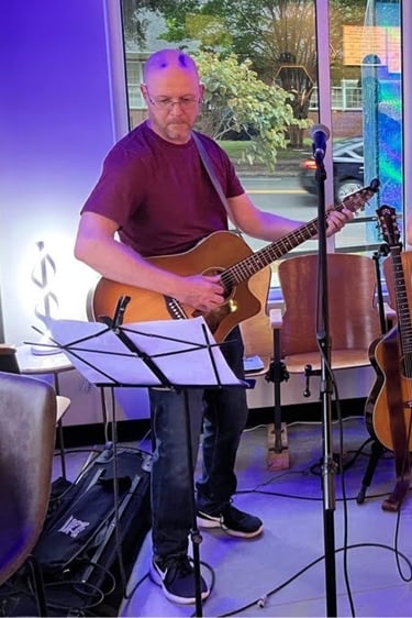 William Finn from Finn's Echo performing in front of live audience