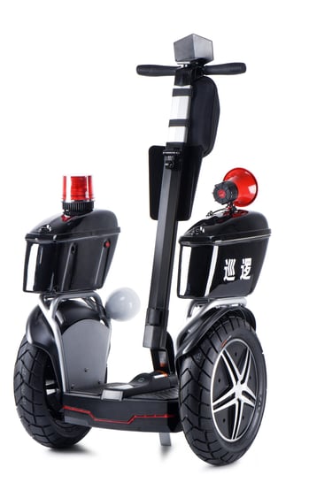 a black and white scooter with a red light on it