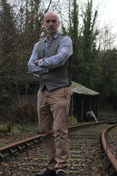 Steve standing at the disused tracks in Amberly