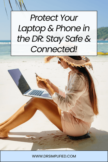 Woman using laptop and phone on a tropical beach in the Dominican Republic, showing how to protect your devices and stay conn