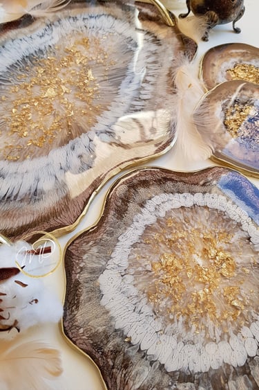 epoxu resin coasters in brown and gold colours