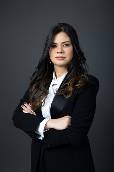 a woman in a suit and tie is posing for a portrait elane marques