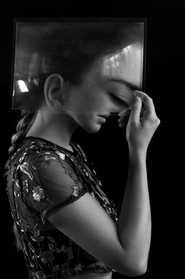 Self-portrait by Anita Papp, distorted through a magnifying sheet, exploring themes of identity and 