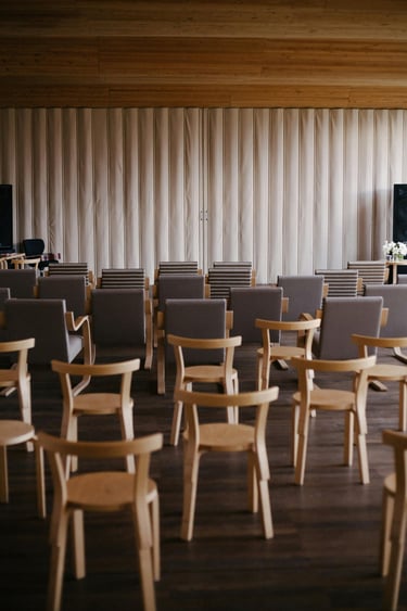 a room with chairs setup for a workshop