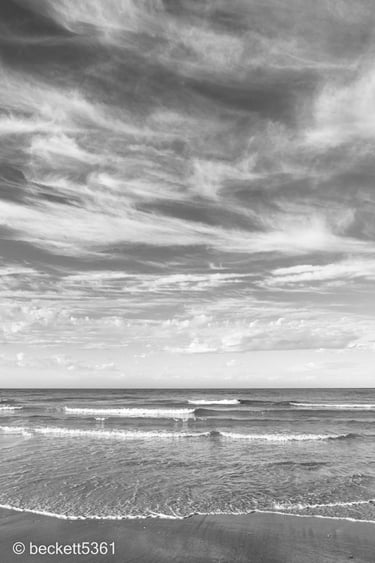 Henley Beach waves and clouds. Black and white
