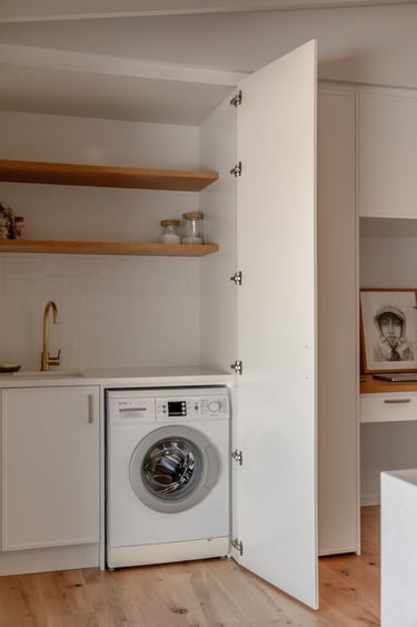 Findlay Residential Builders - hidden laundry - Stanmore Bay renovation