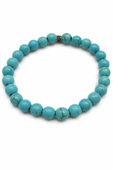 turquoise howlite bracelet with blue veined beads, calming crystal jewelry for emotional balance and confident expression