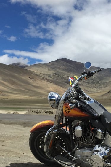 a motorcycle parked in a desert area