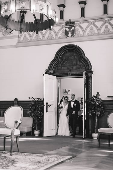 Couple entering a civil ceremony hall.
