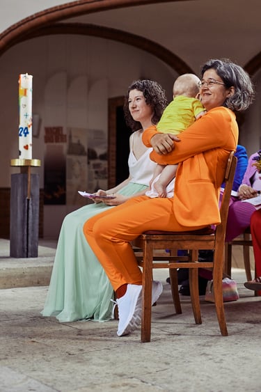 Lesbian couple at wedding ceremony at church.