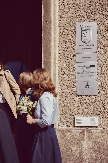 Couple waiting infront of the civil registry in Mitte.