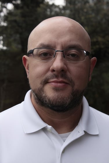 Portrait of Jorge Palacios, Osteopathic Manual Practitioner.