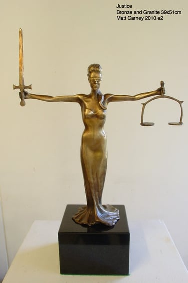 a statue of a lady justice 