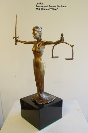 a statue of a lady justice 
