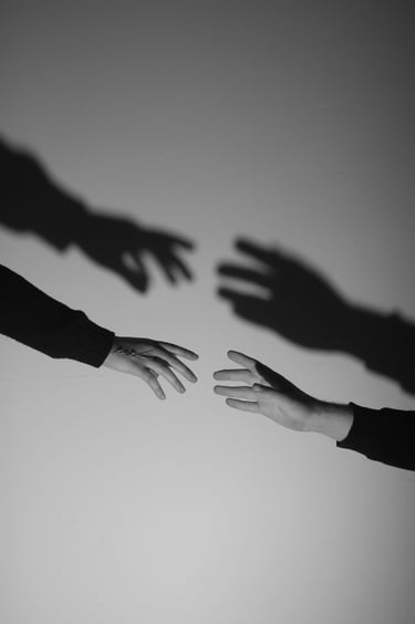 hands reaching for each other