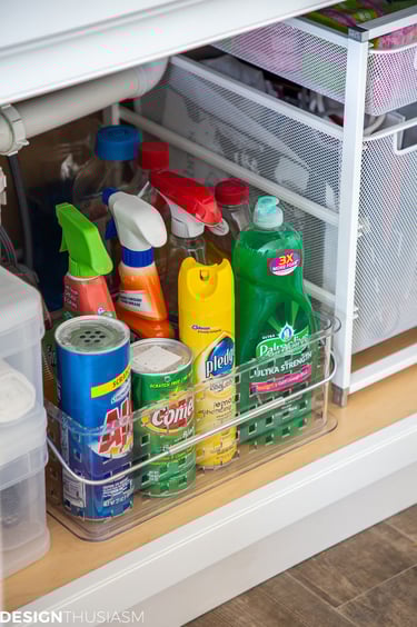 cleaning supplies under sink